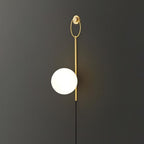 Zephrelle Sculptural Brass Wall Lamp