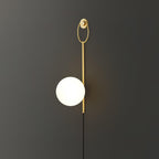 Zephrelle Sculptural Brass Wall Lamp