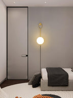 Zephrelle Sculptural Brass Wall Lamp