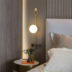 Zephrelle Sculptural Brass Wall Lamp