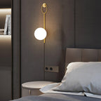 Zephrelle Sculptural Brass Wall Lamp