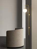 Mirevane Plug-In Glass Globe Brass Wall Lamp