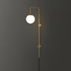 Mirevane Plug-In Glass Globe Brass Wall Lamp