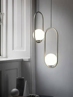 Havorine Glass Globe Brass Swag Pendant Light