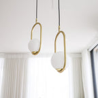 Havorine Glass Globe Brass Swag Pendant Light